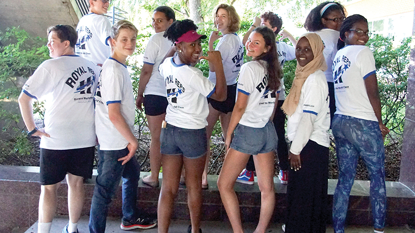 Students pose in their team t-shirts