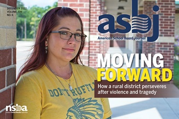 A woman with red hair and wearing a yellow T-shirt looks at the camera next to the words 'moving forward.'