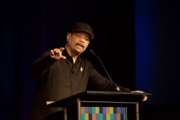 Rapper/Actor Ice-T speaking from a podium
