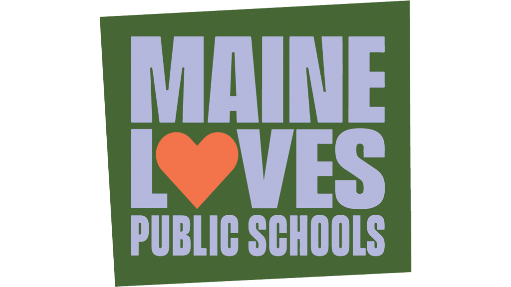 A sign reads 'Maine Loves Public School'