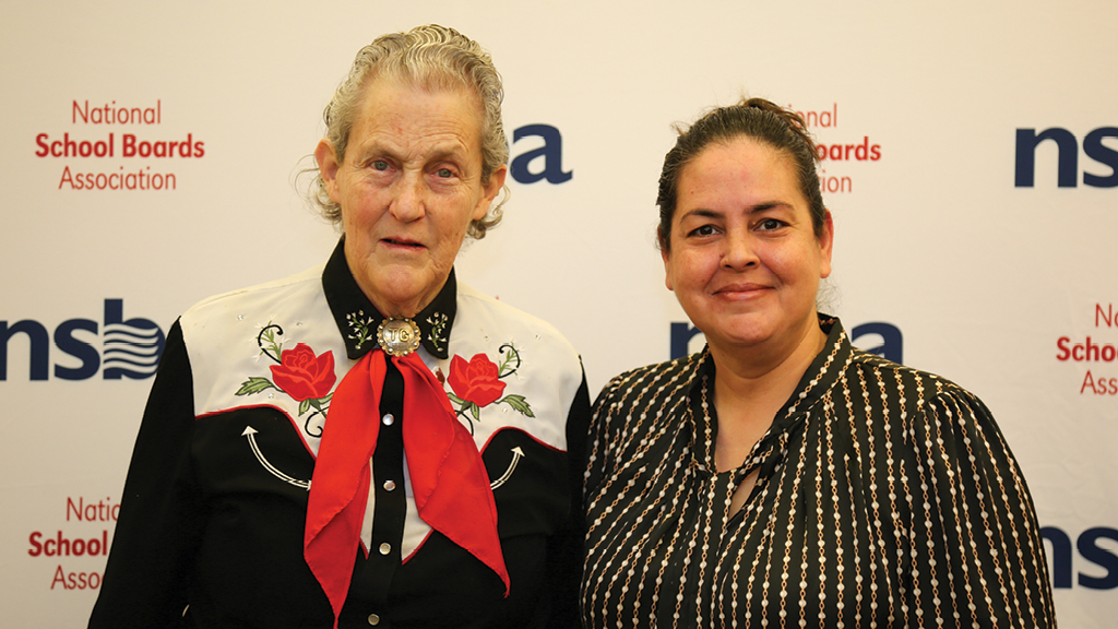 Inventor and college professor Temple Grandin poses with an attendee at one of her speeches.